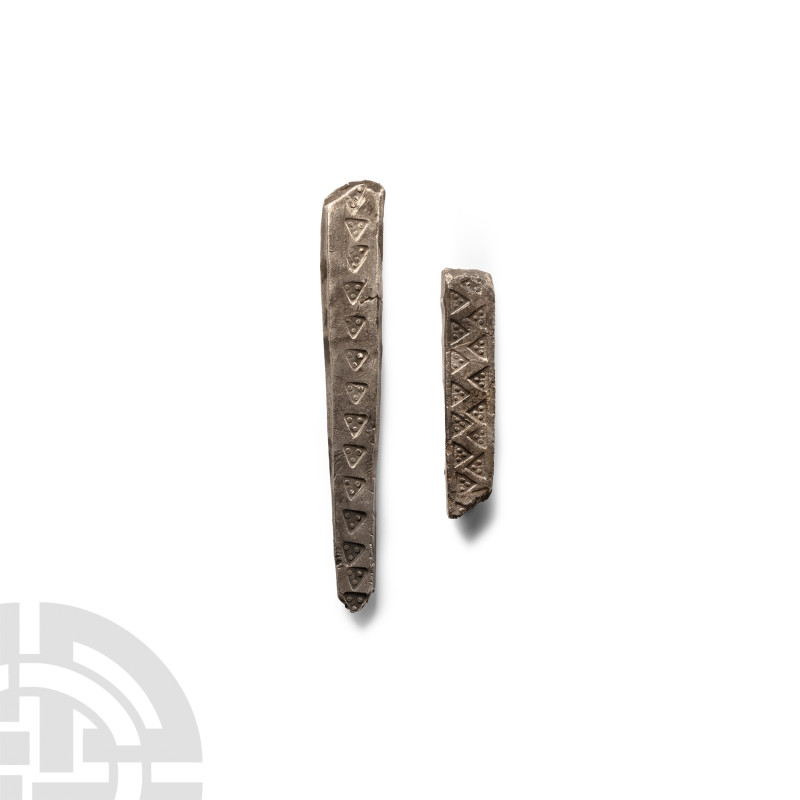 Viking Age Stamped Silver Bar Group
Circa 10th century A.D. One rectangular in ...