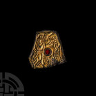 Anglo-Saxon Gilt Bronze Mount with Wolf-Men