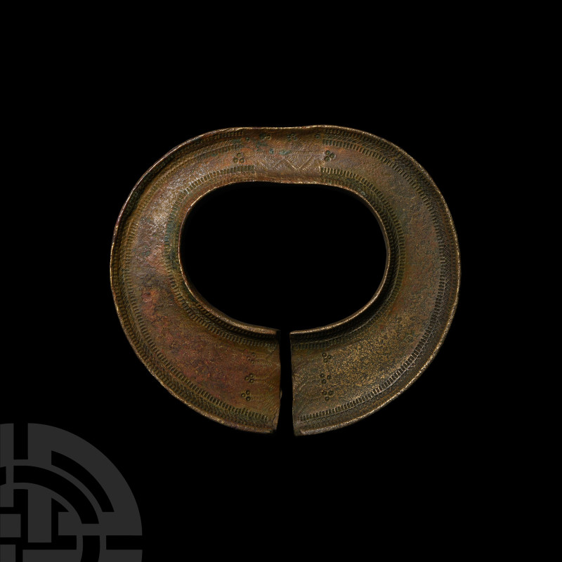 Large Viking Period Decorated Bronze Armlet
Circa 11th century A.D. Of penannul...