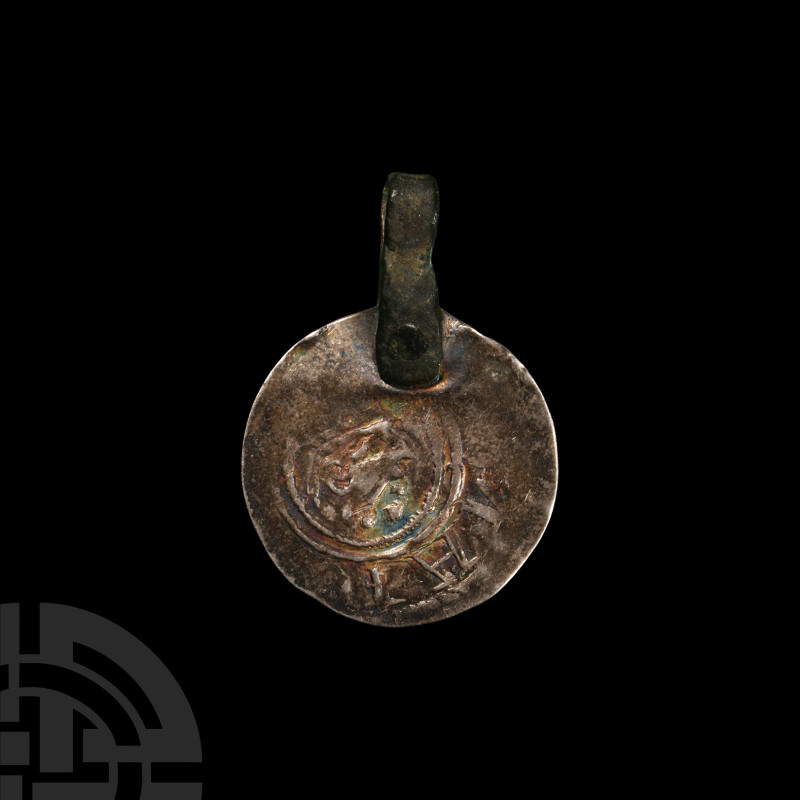Viking Plundered Silver Coin Pendant
9th-12th century A.D. Made from an early m...