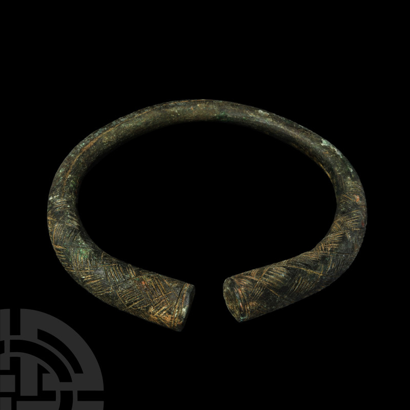 Viking Age Bronze Hatched Panel Bracelet with Trumpet Terminals
9th-11th centur...