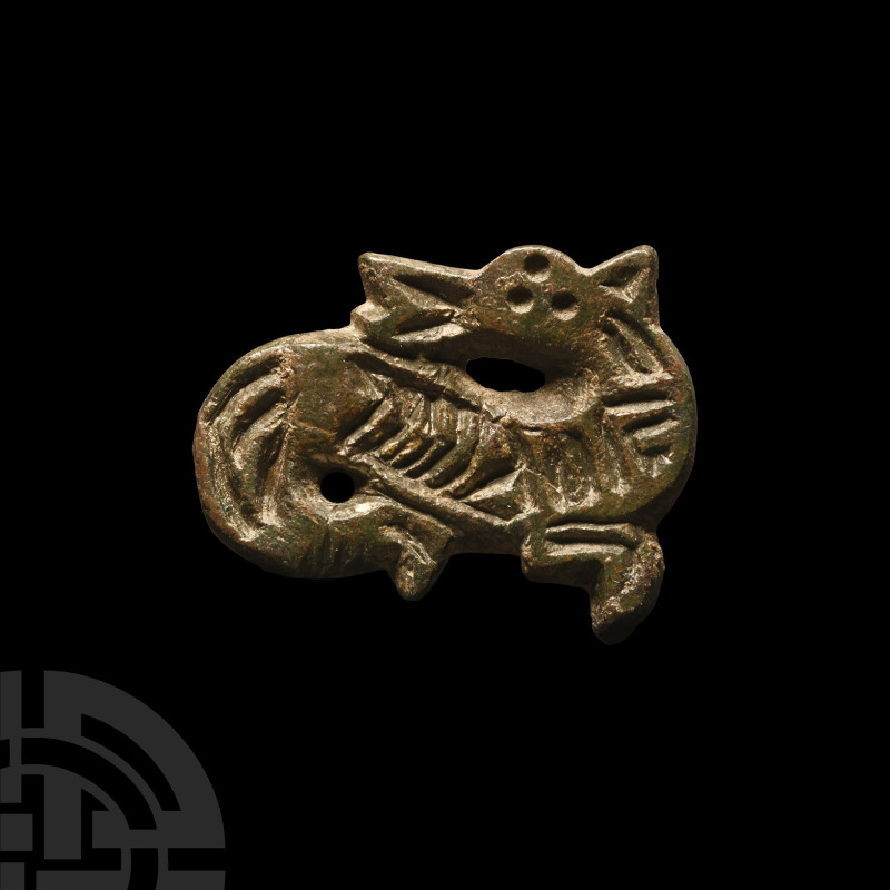 Frankish Bronze Beast Facing Back Plate Brooch
6th century A.D. Formed as a hip...