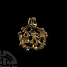 Viking Age Silver-Gilt Gripping Beast Pendant