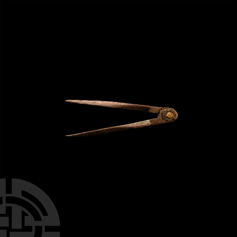Medieval Bronze Dividers
14th-15th century A.D. A compass composed of two artic...