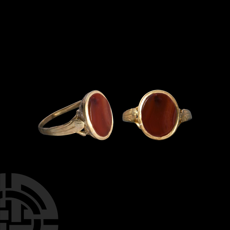 Early Georgian Gold Ring with Gemstone
Early 18th century A.D. Composed of a sl...