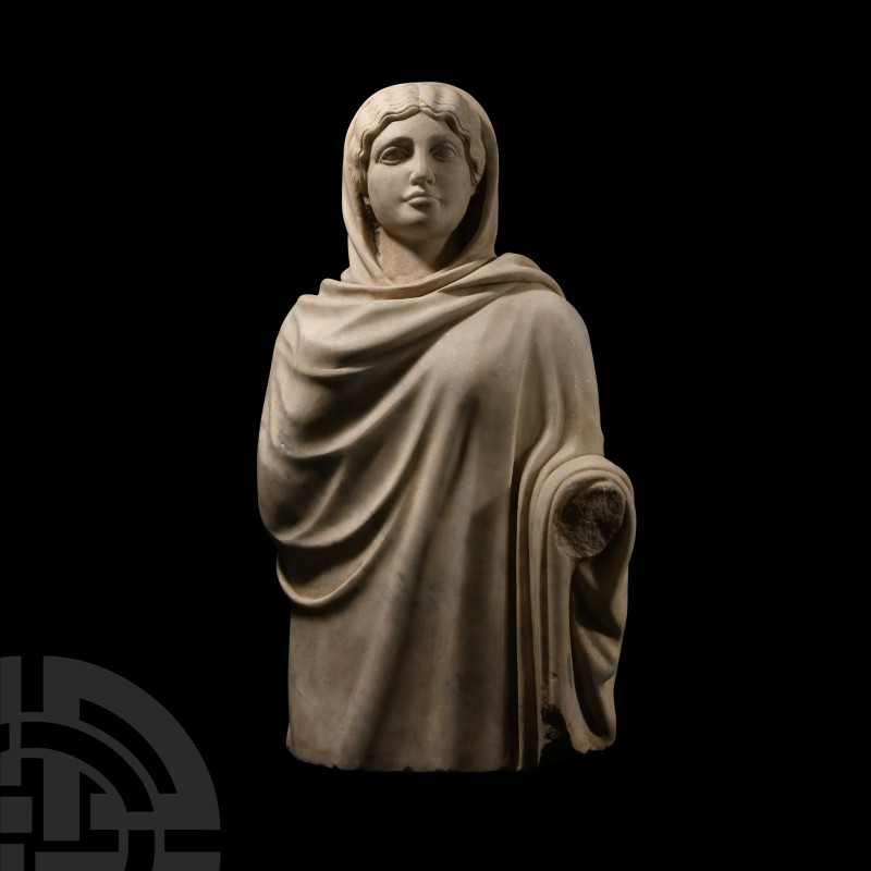 Life-Size Marble Draped Statue of Venus
19th century A.D. Comprising the upper ...