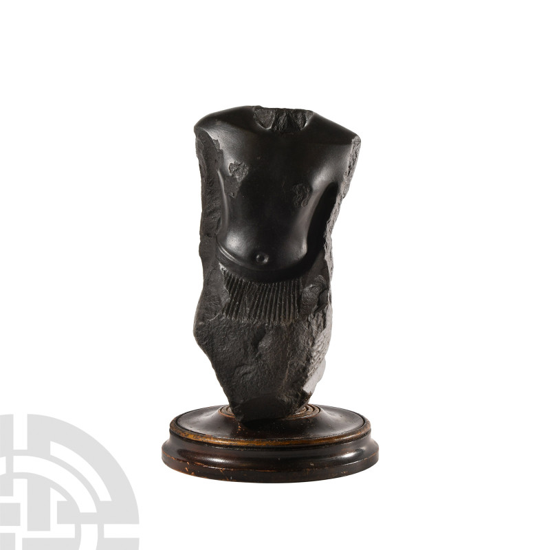 Egyptian Style Basalt Torso of a Pharaoh
19th-20th century A.D. Seated and bare...