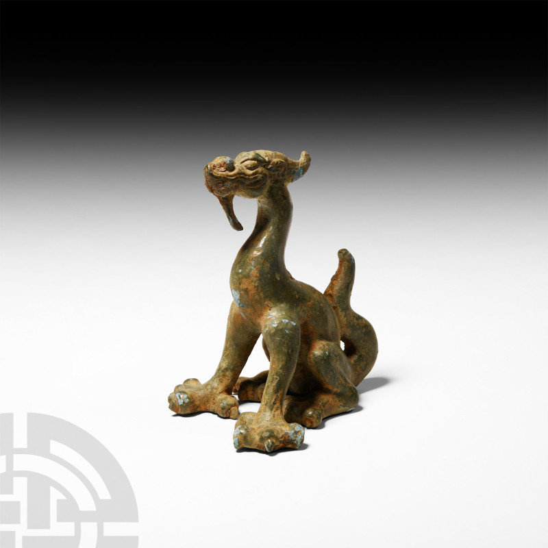 Chinese Han Style Bronze Dragon Weight
19th-20th century A.D. Modelled seated a...