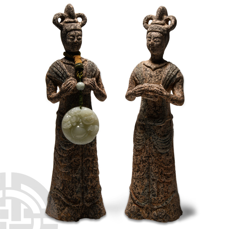 Chinese Style Ceramic Statue Pair
Circa 20th century A.D. Each modelled as a st...
