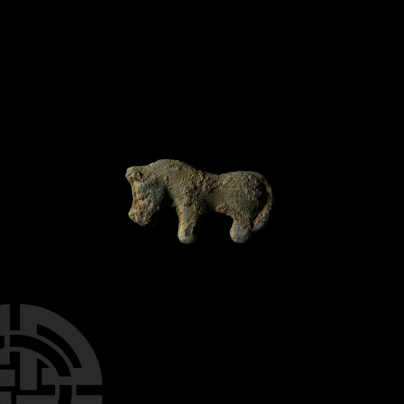 Chinese Ordos Bronze Animal Mount
6th-2nd century B.C. or later. Formed as a st...