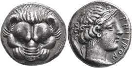 BRUTTIUM. Rhegion. Circa 415/0-387 BC. Tetradrachm (Silver, 24 mm, 17.00 g, 3 h). Facing head of a lion. Rev. ΡHΓINON Head of Apollo to right, wearing...