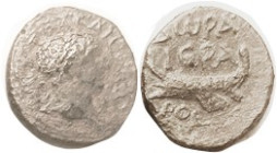 Trajan, Phoenicia, Dora, Æ16, Head r/Lgnd above Galley, date POE= 112/13 AD, Rosenb.28; at least F but moderately rough pale brown patina, portrait sh...