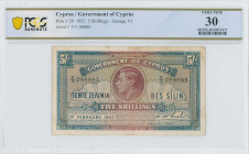 CYPRUS: 5 Shillings (1.2.1952) in brown-violet and blue. Portrait of King George VI at center on face. S/N: "F/3 288885". Inside holder by PCGS "VERY ...