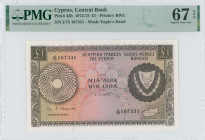 CYPRUS: 1 Pound (1.7.1975) in brown on multicolor. Coat of arms at right on face. S/N: "J/75 107331". WMK: Eagle head. Printed by (BWC). Inside holder...