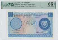 CYPRUS: 5 Pounds (1.7.1975) in blue on multicolor unpt. Coat of arms at right on face. S/N: "Q/159 554545". WMK: Eagle head. Printed by (BWC). Inside ...