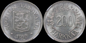FINLAND: 200 Markkaa (1958 H) in silver (0,500). Shielded arms above date on obverse. Denomination surrounded by trees and tree tops on reverse. Insid...