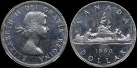 CANADA: 1 Dollar (1960) in silver (0,800). Laureate bust of Queen Elizabeth II facing right on obverse. Voyageur, date and denomination below on rever...