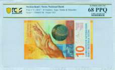 SWITZERLAND: 10 Franken (2017) in yellow and multicolor. Conductor hand holding baton, clock faces and globe on face. S/N: "17M 6601748". Signatures b...