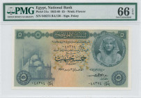EGYPT: 5 Pounds (1957) in dark green, gray-blue and brown. Tutankhamen facing right on face. S/N: "048374 BA/136". WMK: Flower. Signature by Fekry. In...