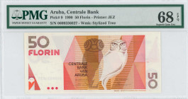 ARUBA: 50 Florin (1.1.1990) in red-brown and multicolor. Owl at center-right on face. S/N: "0609336027". WMK: Stylized tree (watapona). Printed by JEZ...