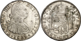 1807. Carlos IV. México. TH. 8 reales. (AC. 986). Leves golpecitos. 26,97 g. MBC+.