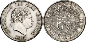 Gran Bretaña. 1818. Jorge III. 1/2 corona. (KM. 672). Escasa y más así. AG. 13,72 g EBC.
