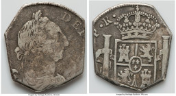 Charles III Cut 8 Reales ND (1777-1789) Fine (Environmental Damage), 31.5mm, 15.15gm. Host: Bolivia. Charles III 8 Reales (PTS)-PR ND (1777-1789) (cf....