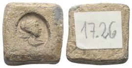 Münzgewichte. Griechisches Münzgewicht.

 Gewicht einer Tetradrachme (Blei). 4. - 3. Jhdt. v. Chr. Magnesia am Mäander.
Vs: Büste der Artemis mit K...