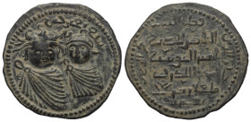 Artuqiden von Mardin. Qutb ad-Din il-Ghazi II. (572 - 580 H. / 1176 - 1184).

 Dirham (Kupfer). 578 H.
Vs: Zwei Büsten en face nebeneinander, oben ...