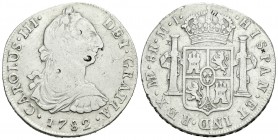 Carlos III (1759-1788). 8 reales. 1782. Lima. MI. (Cal-864). Ag. 26,70 g. Pequeños resellos orientales. BC+. Est...45,00.