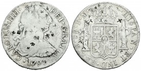 Carlos IV (1788-1808). 8 reales. 1790. México. FM. (Cal-683). Ag. 26,43 g. Busto de Carlos III. Pequeños resellos orientales. BC+. Est...45,00.