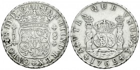 Carlos III (1759-1788). 8 reales. 1769. Potosí. JR. (Cal-969). Ag. 26,63 g. Roseta de 4 pétalos. Punto sobre el anagrama de la ceca. El 9 curvo. Defec...