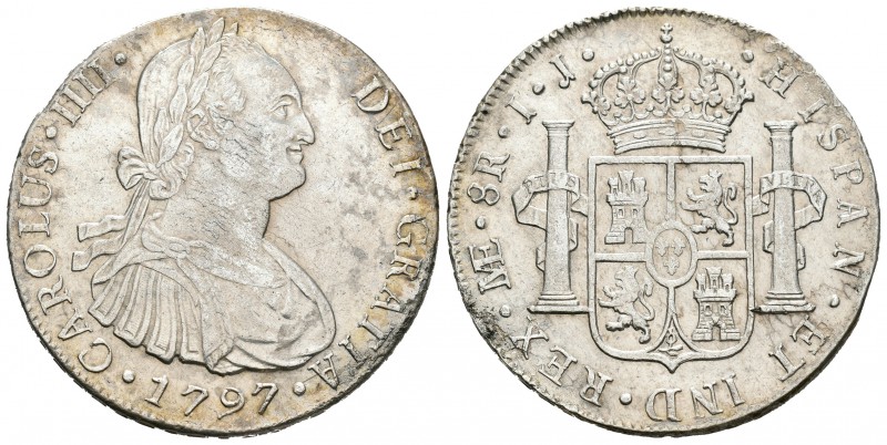 Carlos IV (1788-1808). 8 reales. 1797. Lima. IJ. (Cal-652). Ag. 27,04 g. Anverso...