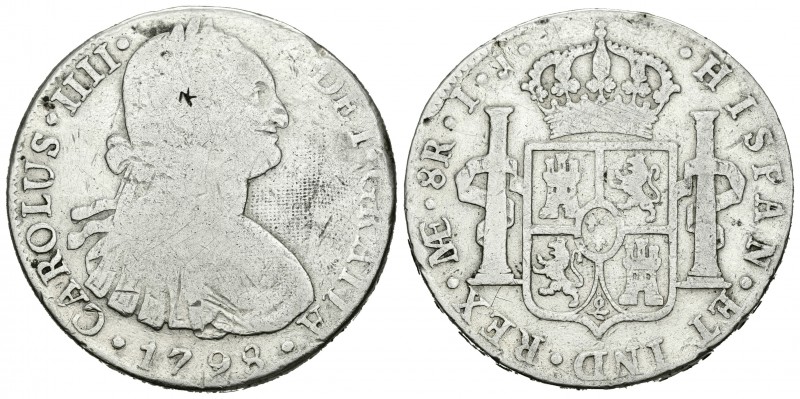 Carlos IV (1788-1808). 8 reales. 1798. Lima. IJ. (Cal-653). Ag. 26,43 g. Resello...