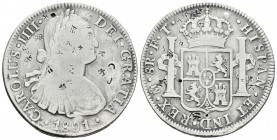 Carlos IV (1788-1808). 8 reales. 1801. México. FT. (Cal-696). Ag. 26,56 g. Pequeños resellos orientales. BC+. Est...25,00.