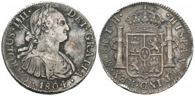 Carlos IV (1788-1808). 8 reales. 1804. México. TH. (Cal-701). Ag. 26,71 g. Raya y golpes. MBC+. Est...50,00.