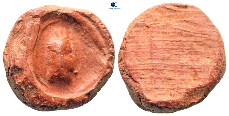 Greek. Clay Tessera

20 mm, 2,12 g

very fine