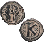 574/5 d.C. Justino II y Sofía. Antioquía. 20 Nummi. 5,33 g.  Justin, a la izquierda, y Sophia, a la derecha, sentados frente a frente en un trono dobl...