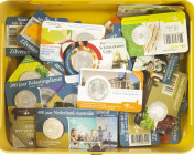 Coins Netherlands in boxes: Euros - Yellow strong box with 5 and 10 euro coins in coincards, also some miscellaneous