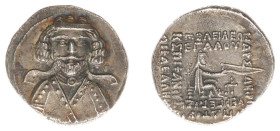 The Parthian Kingdom - Phraates III (ca. 70-58 BC) - AR drachm (3.84 g.). Rhagai mint. Bare-headed bust facing with short beard, wearing necklace with...