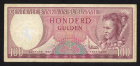 Banknotes Netherlands Oversea - Suriname - 100 Gulden 2.1.1957 (P. 114 / PLS16.4a2) - ink removed in wmk. area - Fine