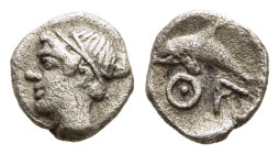 ISLANDS off THRACE. Thasos. Hemiobol (Circa 412-404 BC).

Obv: Head of nymph left.
Rev: ΘΑ.
Dolphin left within incuse lozenge.

Le Rider, Thasiennes ...