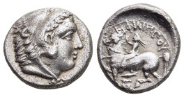 KINGS OF MACEDON. Philip II (359-336 BC). Drachm. Pella.

Obv: Head of Herakles right, wearing lion's skin headdress.
Rev: ΦIΛIΠΠOY.
Youth on horsebac...