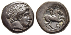 KINGS OF MACEDON. Philip II (359-336 BC). AE Unit. Uncertain mint in Macedon.

Obv: Male head right, wearing tainia.
Rev: ΦΙΛΙΠΠΟΥ.
Youth on horseback...