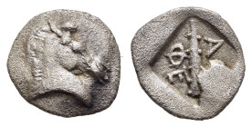 THESSALY. Thessalian League (circa 480s-460s BC). Hemiobol. 

Obv: Horse's head to right. 
Rev: ΦΕ - ΘΑ Club; all within incuse square. 

Cf. BCD II 2...