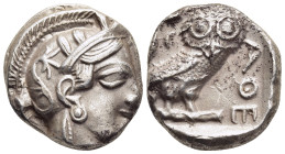 ATTICA. Athens. Tetradrachm (circa 400/390-353 BC).

Obv: Helmeted head of Athena right, with profile eye.
Rev: AΘE.
Owl standing right, head facing; ...