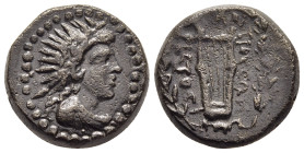 CARIA. Antioch. AE (3rd century BC). Aristos, magistrate.

Obv: Radiate and draped bust of Helios right.
Rev: ANTIOXЄΩN / APICTOC.
Lyre within wreath....