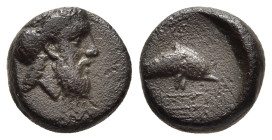 CARIA. Nysiros. AE (Mid 4th-late 3rd century BC).

Obv: Laureate head of Zeus right.
Rev: Dolphin swimming right; below, trident below.

BMC 3.

Condi...