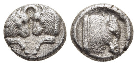 CARIA. Uncertain. Diobol (circa 5th century BC).

Obv: Confronted foreparts of two bulls. 
Rev: Head and neck of a bull to right within incuse square....