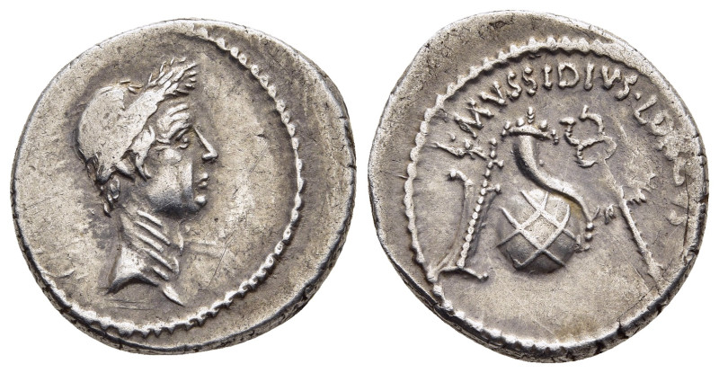 JULIUS CAESAR. Denarius (42 BC). Rome. L. Mussidius Longus, moneyer.

Obv: Laure...